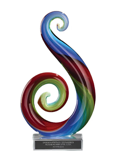 7 in.  Art Glass Multi Color Curley Que on Clear Glass Base