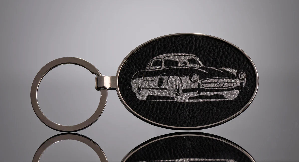 3" x 1 3/4" Laserable Leatherette/Metal Oval Keychain