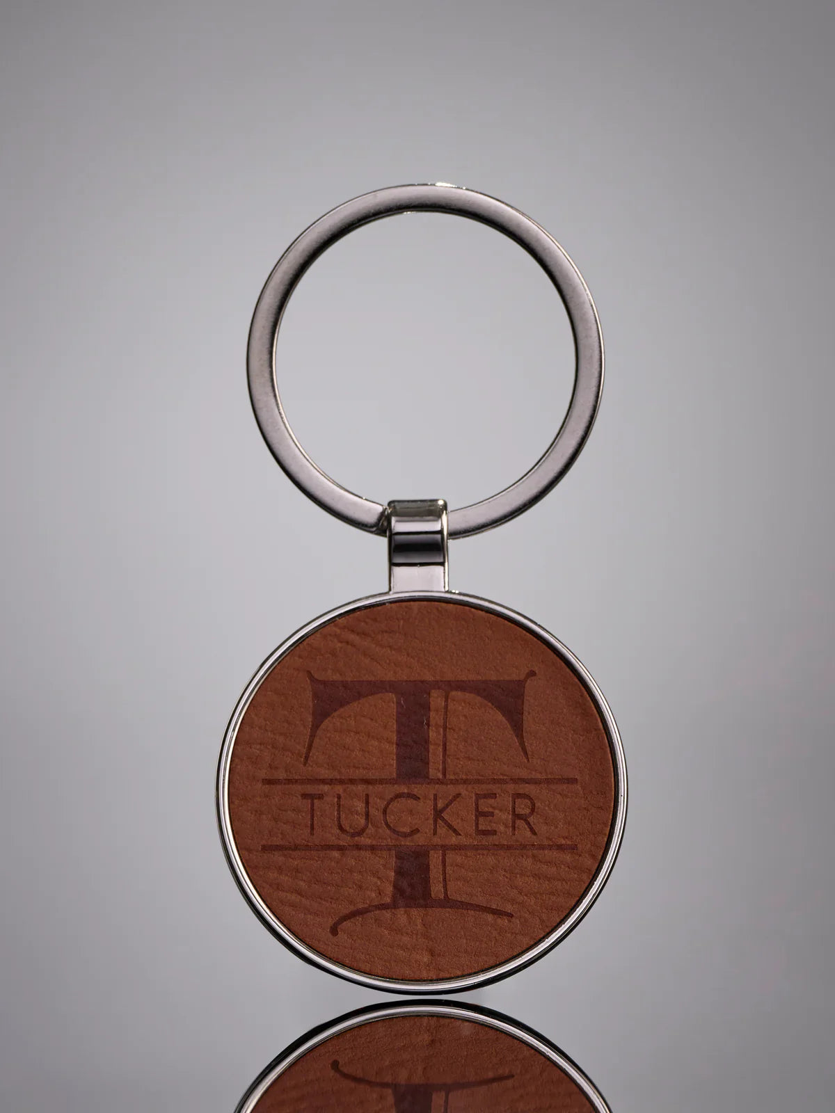 1-1/2" Laserable Leatherette/Metal Rawhide Round Keychain